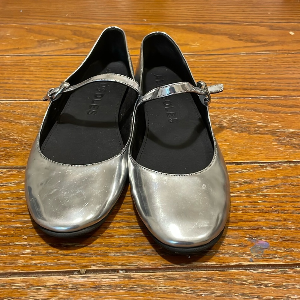 Silver ballet flats. Hardly worn- excellent condition